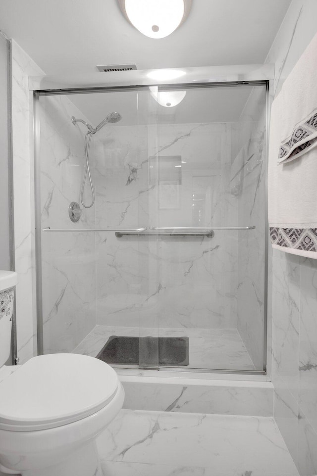 23247 Barwood Ln Unit 305, Boca Raton, FL 33428 - full bathroom featuring toilet, a marble finish shower, and marble look tile flooring