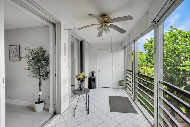 23247 Barwood Ln Unit 305, Boca Raton, FL 33428 - sunroom featuring tile patterned flooring