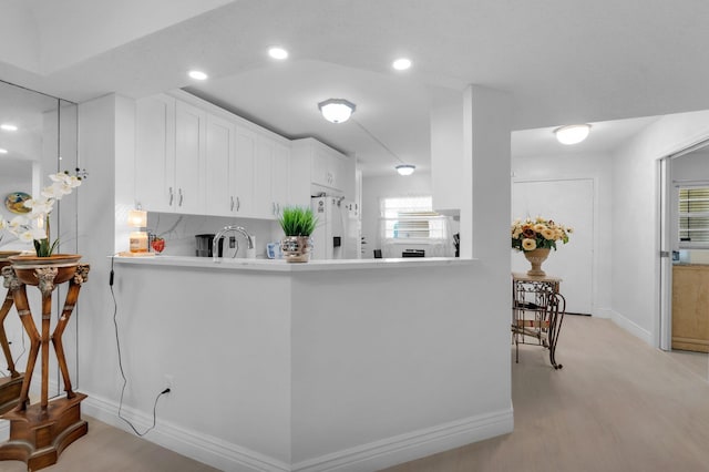 23247 Barwood Ln Unit 305, Boca Raton, FL 33428 - kitchen featuring white refrigerator with ice dispenser, baseboards, white cabinets, recessed lighting, and light countertops