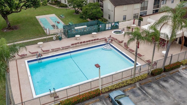 7690 Tahiti Ln Unit 102, Lake Worth, FL 33467 - community pool with a patio area