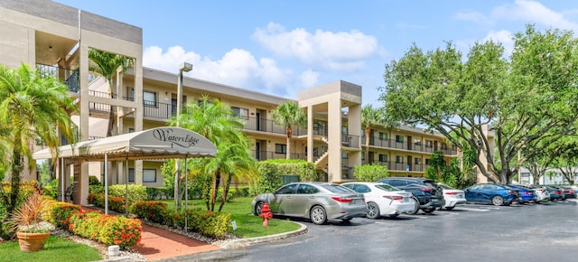 15324 Lakes Of Delray Blvd Unit 210, Delray Beach, FL 33484 - view of apartment building / complex with uncovered parking