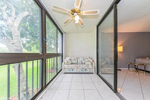 15324 Lakes Of Delray Blvd Unit 210, Delray Beach, FL 33484 - sunroom featuring a ceiling fan