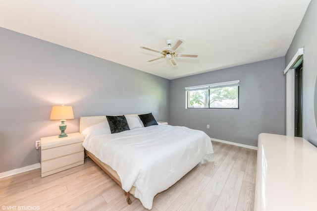 15324 Lakes Of Delray Blvd Unit 210, Delray Beach, FL 33484 - bedroom with light wood-style floors and ceiling fan