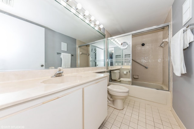 15324 Lakes Of Delray Blvd Unit 210, Delray Beach, FL 33484 - bathroom with tile patterned floors, vanity, and shower / bath combination with glass door