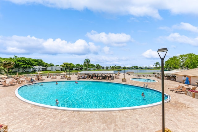 15324 Lakes Of Delray Blvd Unit 210, Delray Beach, FL 33484 - community pool with a patio area and a hot tub