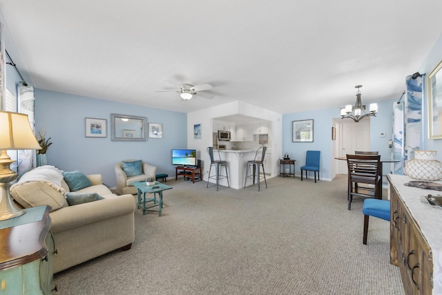 735 Monaco P, Delray Beach, FL 33446 - living area with a chandelier, light colored carpet, and a ceiling fan