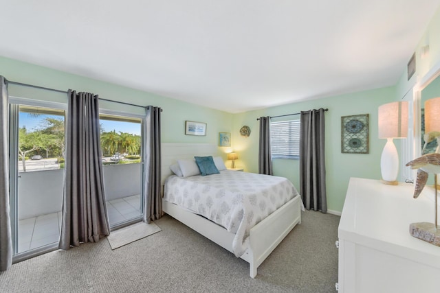 735 Monaco P, Delray Beach, FL 33446 - bedroom featuring light colored carpet and access to exterior