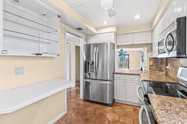 1040 Banyan Rd Unit 501C, Boca Raton, FL 33432 - kitchen featuring stainless steel appliances, white cabinets, tile patterned floors, recessed lighting, and ceiling fan