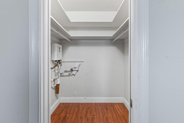 1040 Banyan Rd Unit 501C, Boca Raton, FL 33432 - walk in closet with wood finished floors and water heater
