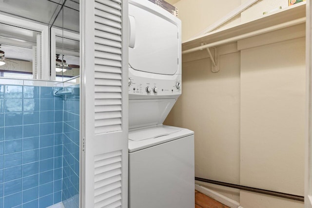 1040 Banyan Rd Unit 501C, Boca Raton, FL 33432 - laundry area featuring stacked washing machine and dryer