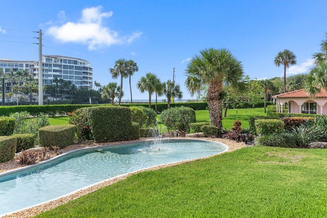 1040 Banyan Rd Unit 501C, Boca Raton, FL 33432 - view of pool featuring a lawn