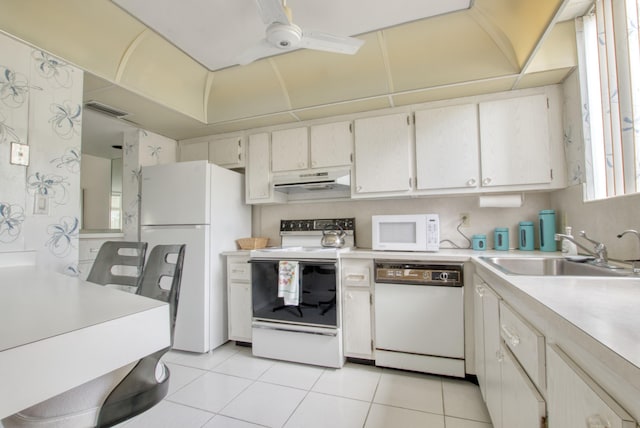 4795 Esedra Ct Unit 4795, Lake Worth, FL 33467 - kitchen with white appliances, a sink, under cabinet range hood, light countertops, and light tile patterned flooring