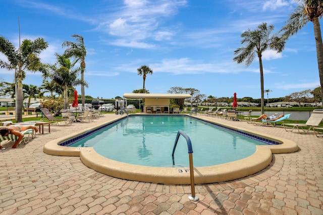 community pool with a patio