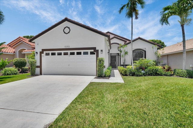 10393 Lexington Cir S, Boynton Beach, FL 33436 - view of front of property with a garage, stucco siding, driveway, and a front lawn