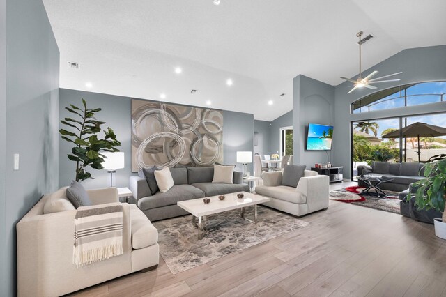 10393 Lexington Cir S, Boynton Beach, FL 33436 - living area featuring wood finished floors, high vaulted ceiling, a ceiling fan, and recessed lighting