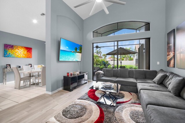 10393 Lexington Cir S, Boynton Beach, FL 33436 - living area with high vaulted ceiling, light wood finished floors, and ceiling fan