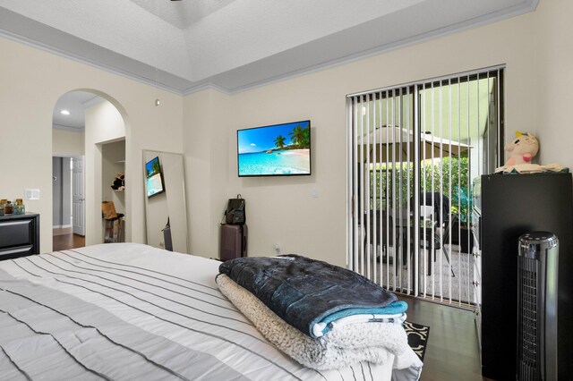 10393 Lexington Cir S, Boynton Beach, FL 33436 - bedroom featuring arched walkways, access to outside, wood finished floors, and recessed lighting