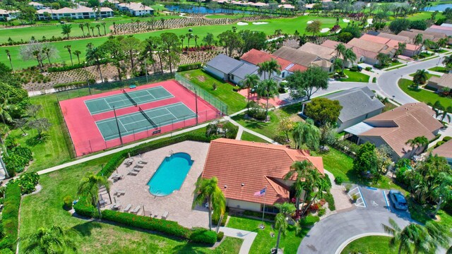 10393 Lexington Cir S, Boynton Beach, FL 33436 - aerial view of residential area featuring a nearby body of water, a pool area, and a local golf course