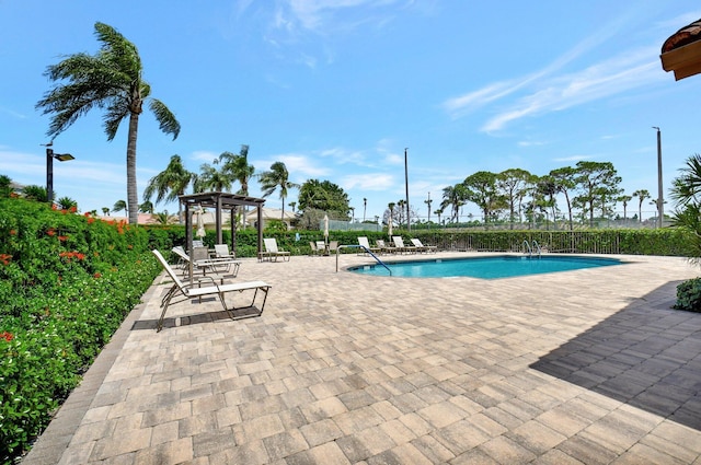 10393 Lexington Cir S, Boynton Beach, FL 33436 - community pool featuring a pergola and a patio