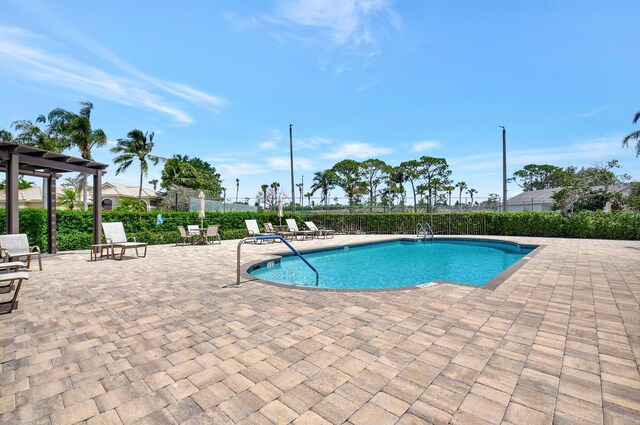 10393 Lexington Cir S, Boynton Beach, FL 33436 - community pool with a patio area