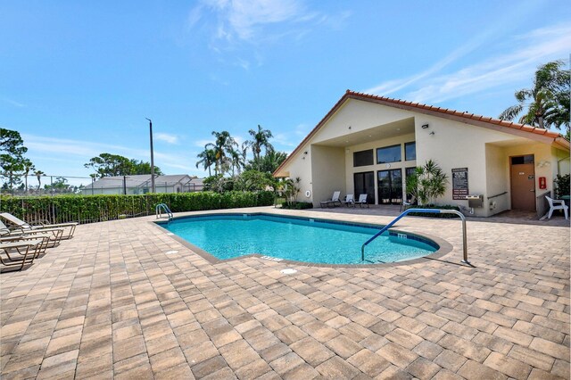 10393 Lexington Cir S, Boynton Beach, FL 33436 - community pool featuring a patio area