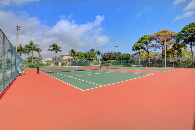 10393 Lexington Cir S, Boynton Beach, FL 33436 - view of tennis court featuring community basketball court