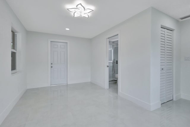 5305 Cleveland Rd, Delray Beach, FL 33484 - spare room featuring baseboards and recessed lighting
