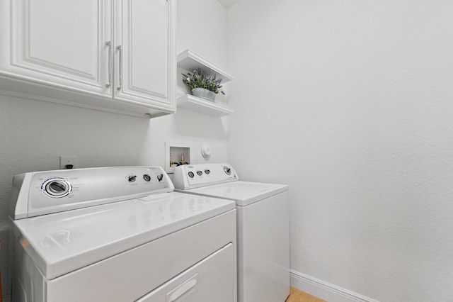 4608 Cadiz Cir, Palm Beach Gardens, FL 33418 - laundry room featuring washer and dryer, cabinet space, and baseboards