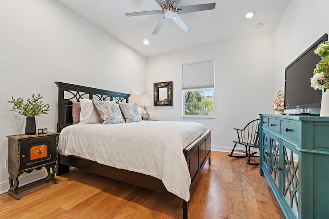 4608 Cadiz Cir, Palm Beach Gardens, FL 33418 - bedroom featuring light wood-style flooring, baseboards, recessed lighting, and ceiling fan