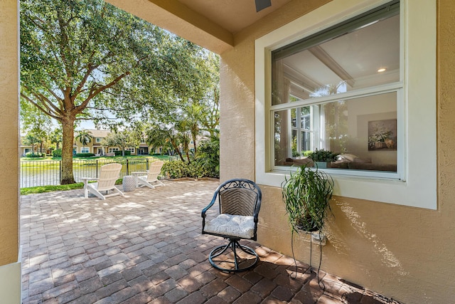 4608 Cadiz Cir, Palm Beach Gardens, FL 33418 - view of patio with a water view
