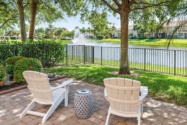 4608 Cadiz Cir, Palm Beach Gardens, FL 33418 - view of patio / terrace with a water view