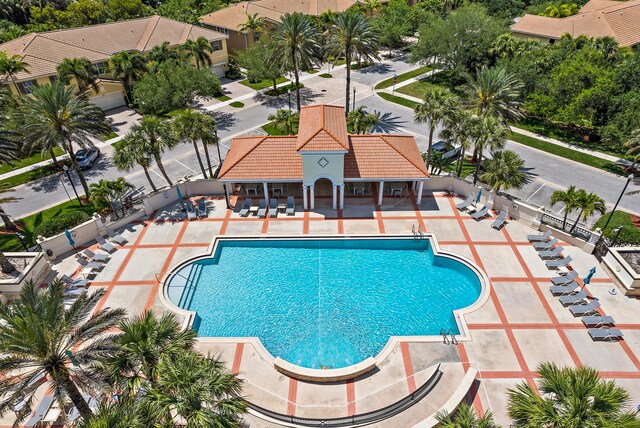 4608 Cadiz Cir, Palm Beach Gardens, FL 33418 - community pool featuring a patio area