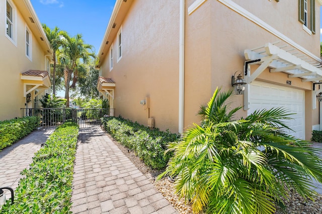 4608 Cadiz Cir, Palm Beach Gardens, FL 33418 - view of home's community with an attached garage