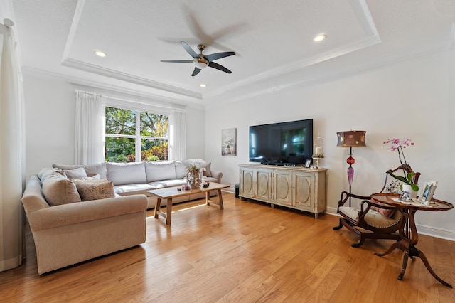 4608 Cadiz Cir, Palm Beach Gardens, FL 33418 - living area with a raised ceiling, ceiling fan, light wood-style floors, ornamental molding, and recessed lighting