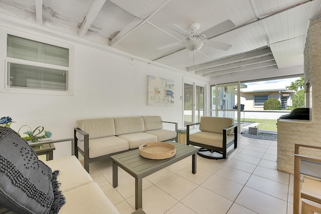 sunroom featuring a ceiling fan, an outdoor hangout area, and french doors