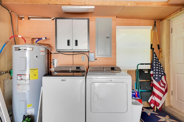 laundry area featuring electric water heater, independent washer and dryer, and electric panel