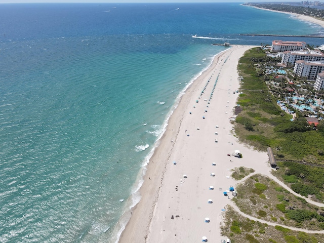 bird's eye view of waterfront with a beach