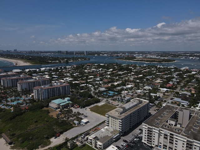 view of urban area with a large body of water