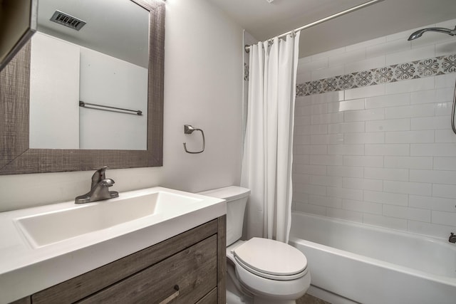 full bathroom featuring toilet, shower / tub combo, and vanity