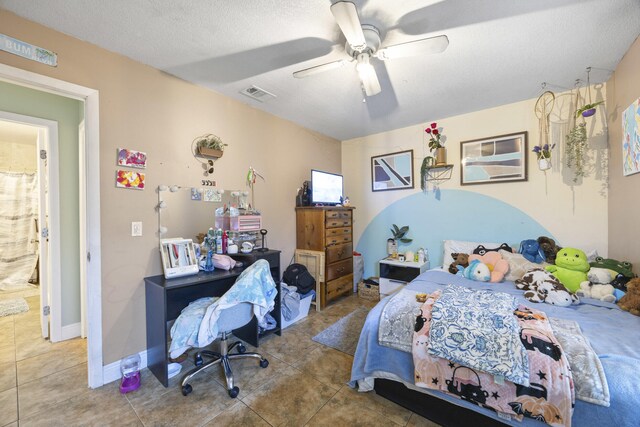 2442 SW Lafayette St, Port Saint Lucie, FL 34984 - tiled bedroom with a ceiling fan