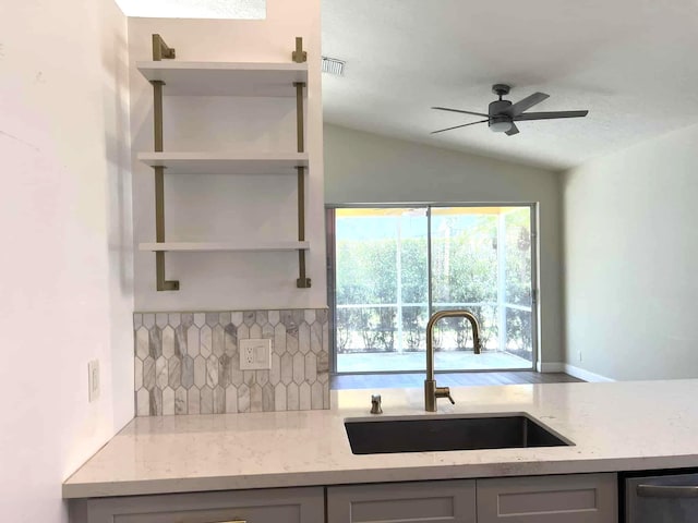 12299 Wedge Way, Boynton Beach, FL 33437 - kitchen featuring a sink, backsplash, ceiling fan, vaulted ceiling, and stainless steel dishwasher