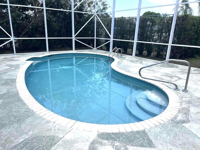 12299 Wedge Way, Boynton Beach, FL 33437 - swimming pool featuring a lanai and a patio