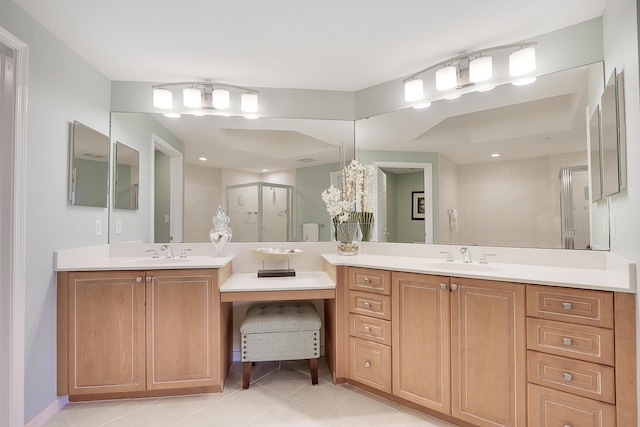 230 Ocean Grande Blvd Unit 501, Jupiter, FL 33477 - full bath featuring tile patterned floors, a stall shower, and two vanities