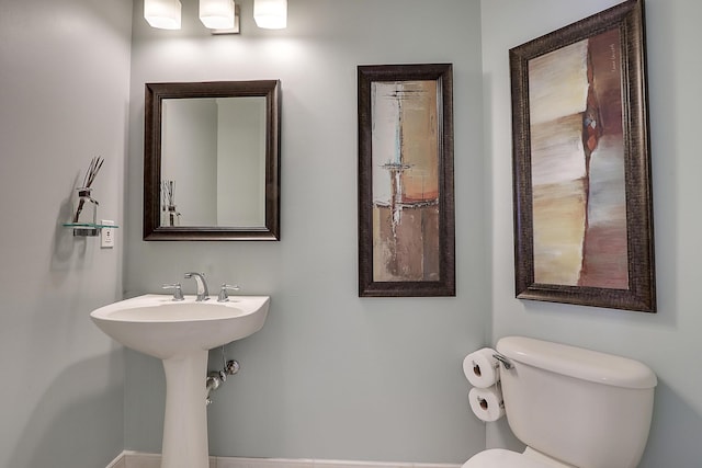 230 Ocean Grande Blvd Unit 501, Jupiter, FL 33477 - bathroom featuring toilet and baseboards
