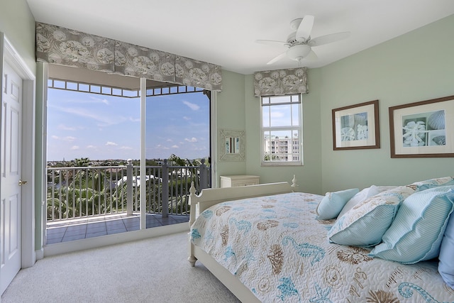 230 Ocean Grande Blvd Unit 501, Jupiter, FL 33477 - bedroom featuring access to outside, carpet flooring, and a ceiling fan