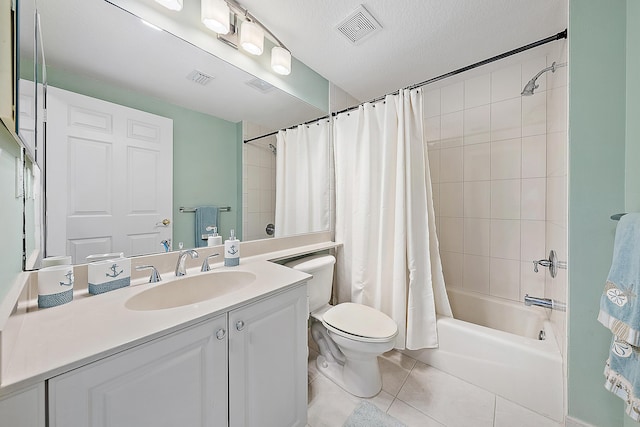 230 Ocean Grande Blvd Unit 501, Jupiter, FL 33477 - full bathroom with tile patterned floors, toilet, vanity, and shower / tub combo with curtain