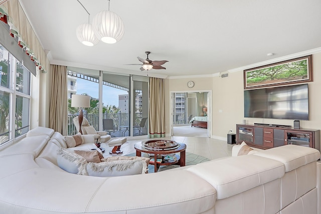 230 Ocean Grande Blvd Unit 501, Jupiter, FL 33477 - living room featuring light tile patterned floors, crown molding, ceiling fan, baseboards, and a chandelier