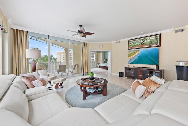 230 Ocean Grande Blvd Unit 501, Jupiter, FL 33477 - living room featuring a ceiling fan, crown molding, light tile patterned flooring, floor to ceiling windows, and baseboards