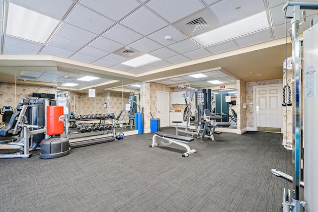 230 Ocean Grande Blvd Unit 501, Jupiter, FL 33477 - exercise room featuring wallpapered walls, carpet flooring, and a paneled ceiling