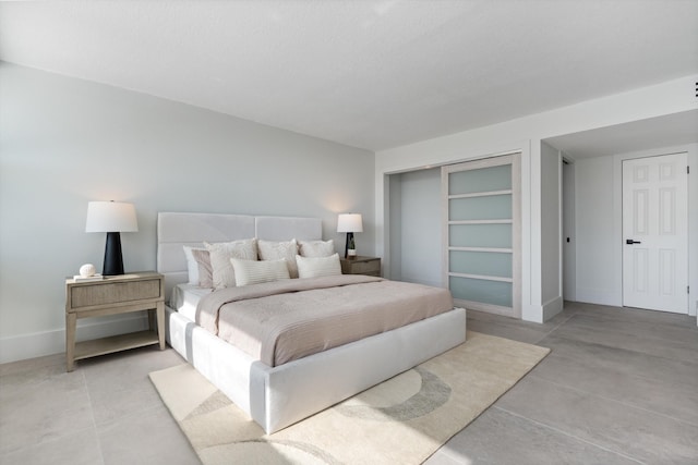 2800 E Sunrise Blvd Unit 4C, Fort Lauderdale, FL 33304 - bedroom with a closet and concrete flooring